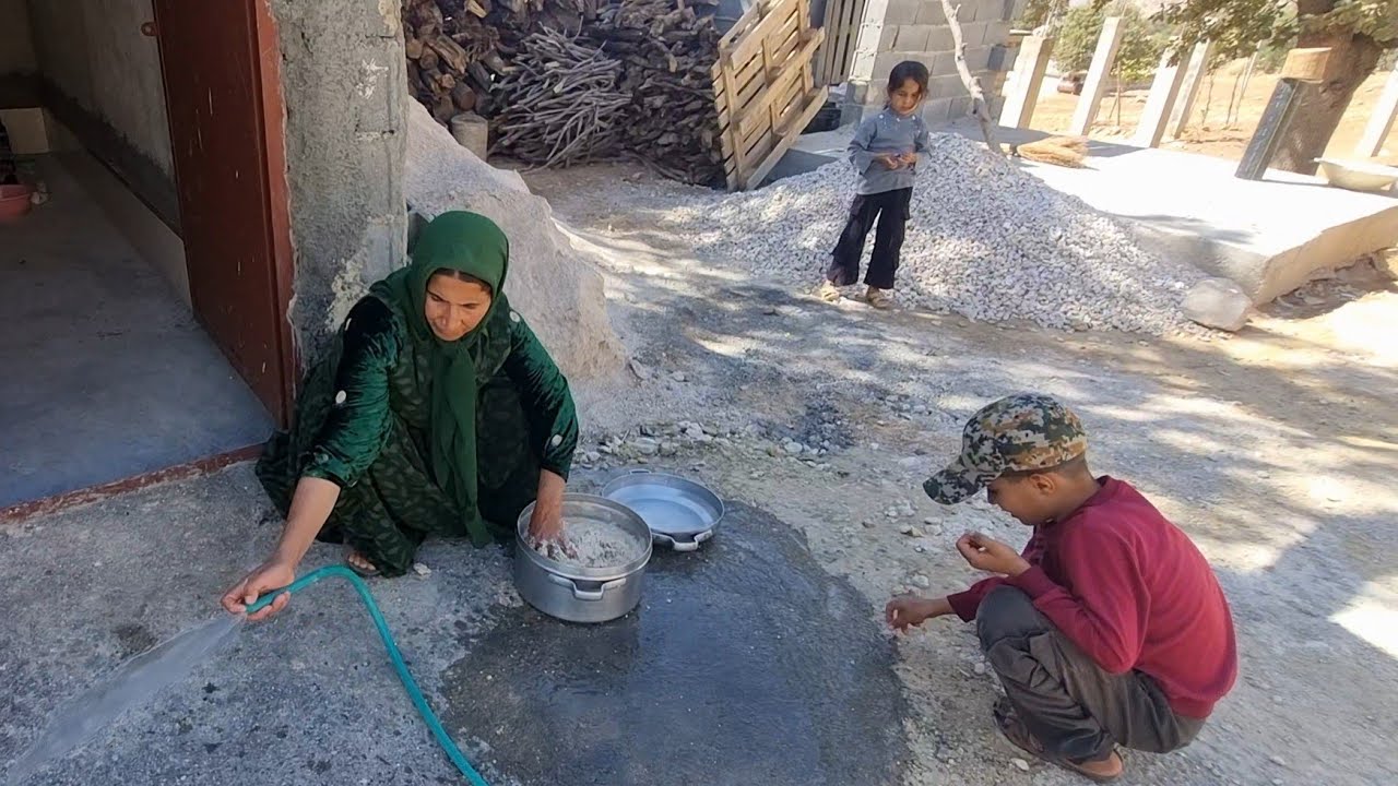 The peace of a village life of a mother with her children