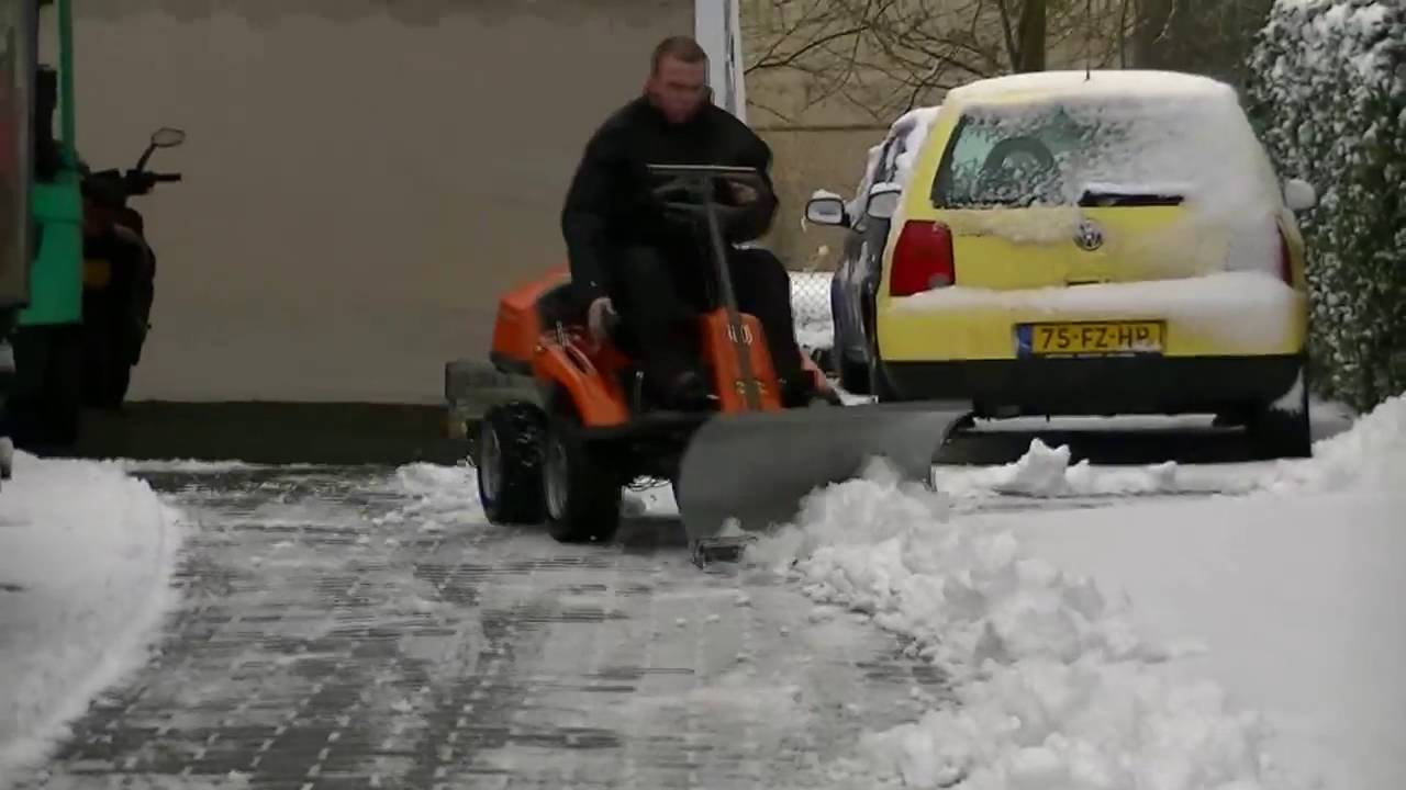 Райдер Husqvarna для уборки снега