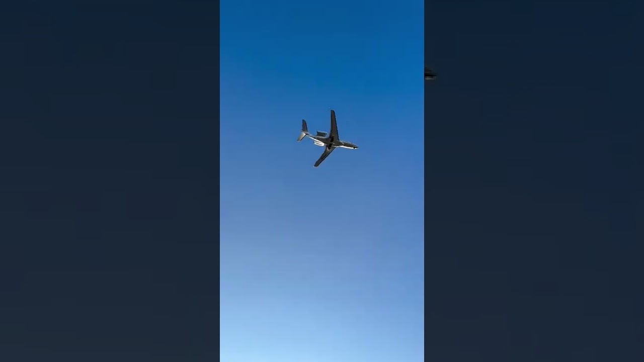 Embraer Phenom 300 CS-PHD landing Farnborough