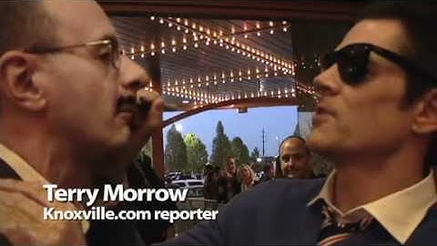 Terry Morrow gets body art from Johnny Knoxville