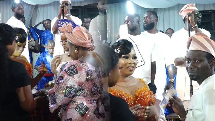 SEE HOW MIDE MARTINS AND OTHERS RAIN MONEY ON REGINA CHUKWU AT HER HOUSE WARMING CEREMONY