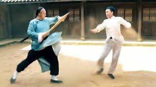 The young man, staff in hand, came to seek out Diep Van to test his martial arts skills against him.