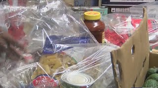 Local organization delivering food baskets, covid tests to families in need