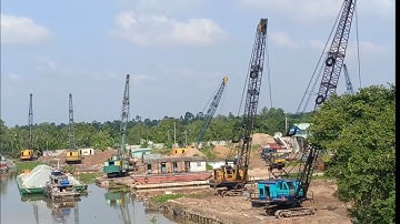 Xà lan chở đá. Xáng dây trên bãi cát nơi hội tụ và làm việc những chiếc xáng dây 1023- Thủy Miền Tây