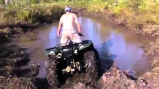 Four Wheeler in Deep Mud Hole