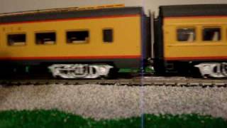 A slow crossing of the Union Pacific 844 / passenger cars HO DCC
