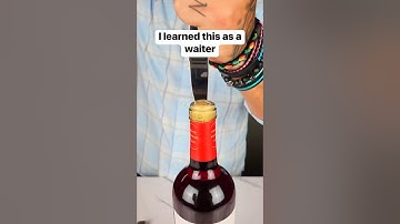 How to open a wine bottle when you can’t find the cork screw #wine #restaurant #waiter #catering