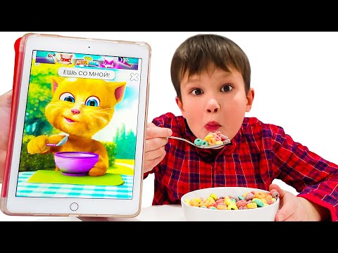 Макс и Катя повторяют за игрой Кот Джинджер