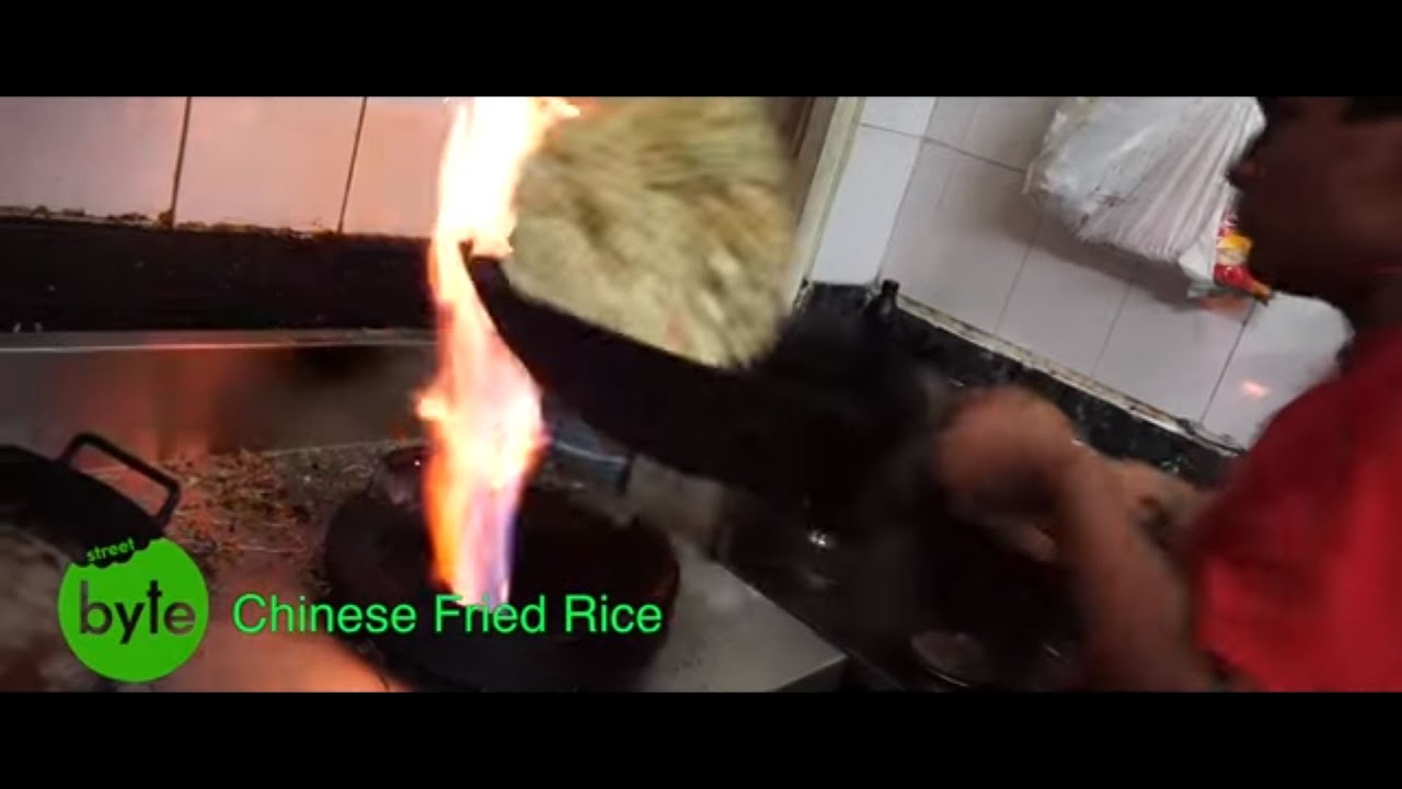 Amazing skills by the chef , Egg and Chicken fried rice restaurant style | Street Byte