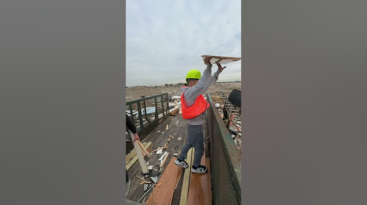 Dumping trash at the landfill site