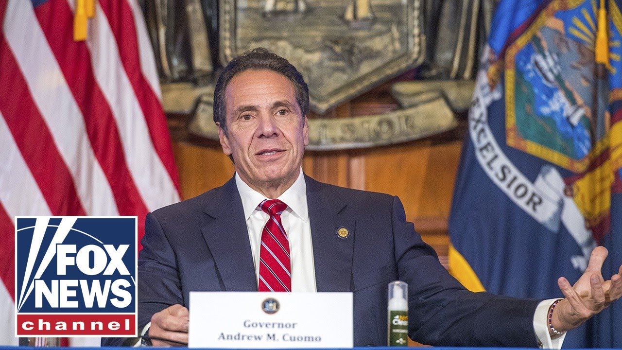 Critics call for Andrew Cuomo to face criminal charges over book deal