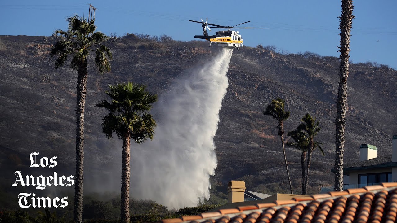 Firefighters halt progress of brush fire near Laguna Beach - YouTube