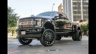 Blacked out 2017 F350 on 26s Fully tuned and deleted cruises downtown!