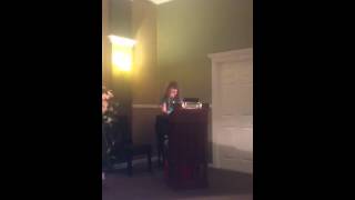 Madelynn singing over the rainbow at moms funeral