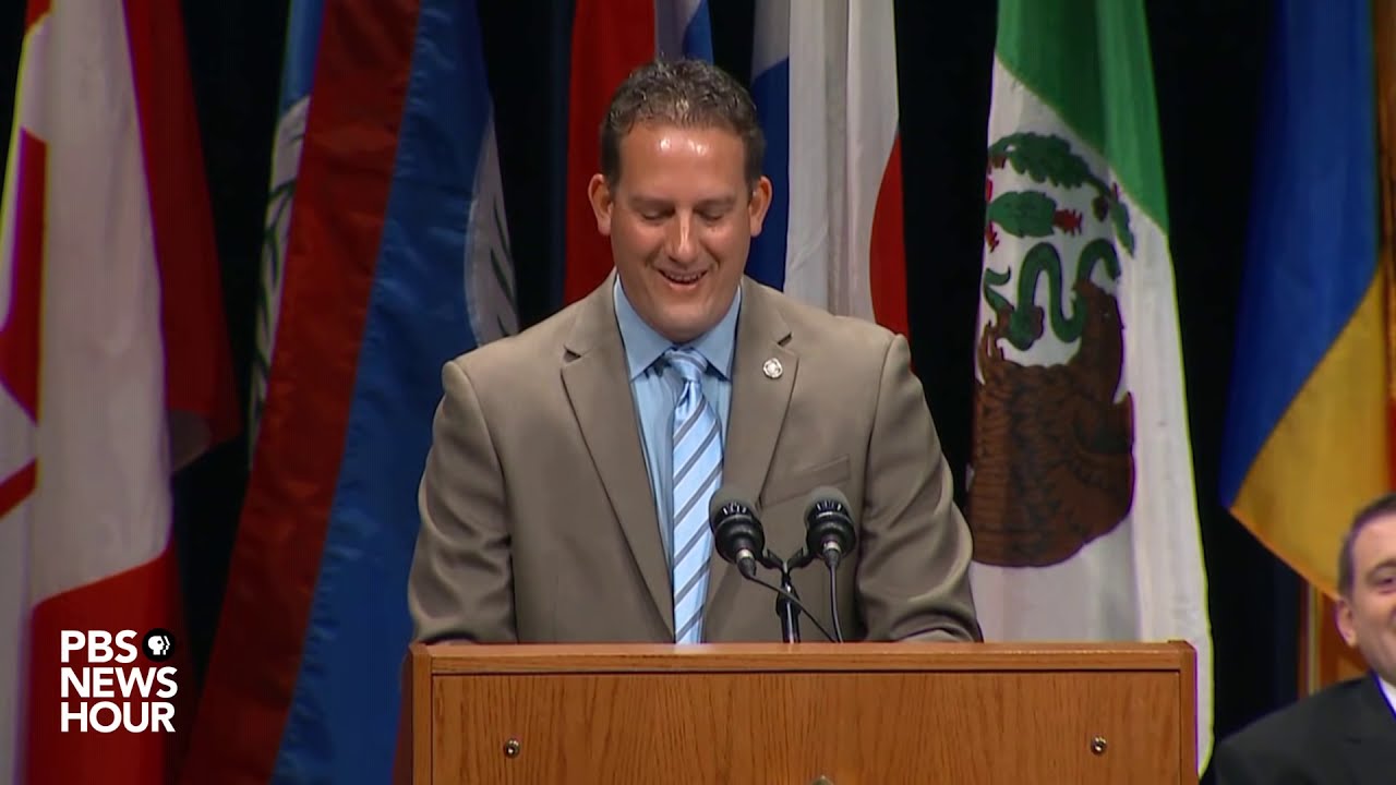 WATCH Barr and Wray address FBI National Academy graduates in Quantico