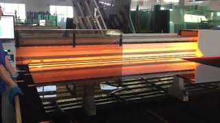 Our Intermac cutting machine is running to cut laminated glass