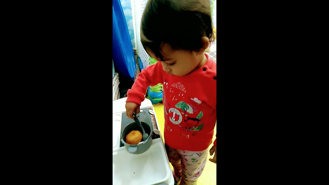 Ritu Playing With Kitchen Set