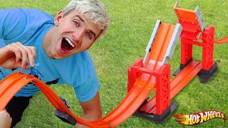 WE BUILT THE MOST EPIC HOT WHEELS TRACK IN OUR BACKYARD! CHECK OUT THIS EPIC VLOG! Thanks again to our 