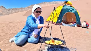 Cooking roasted chicken in the beautiful desert with my children.