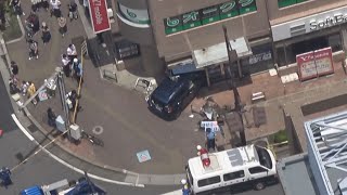 ビルに車、通行人2人けが 運転の80代も、千葉・船橋