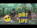 Mini Excavator Grading A Hill