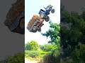 Flying tractor in village