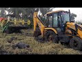 John deere harvester 5310 stuck in the mud and jcb 3DX || backhoe operator pull the harvester