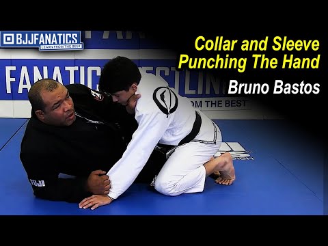 Collar And Sleeve Punching The Hand by Bruno Bastos