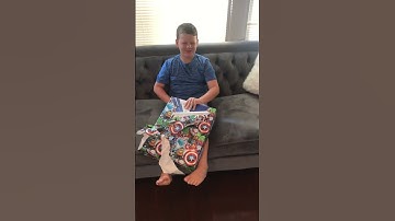 Kid unboxing ps4 for the first time