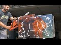 Epoxy  wood carved into a grizzly bear