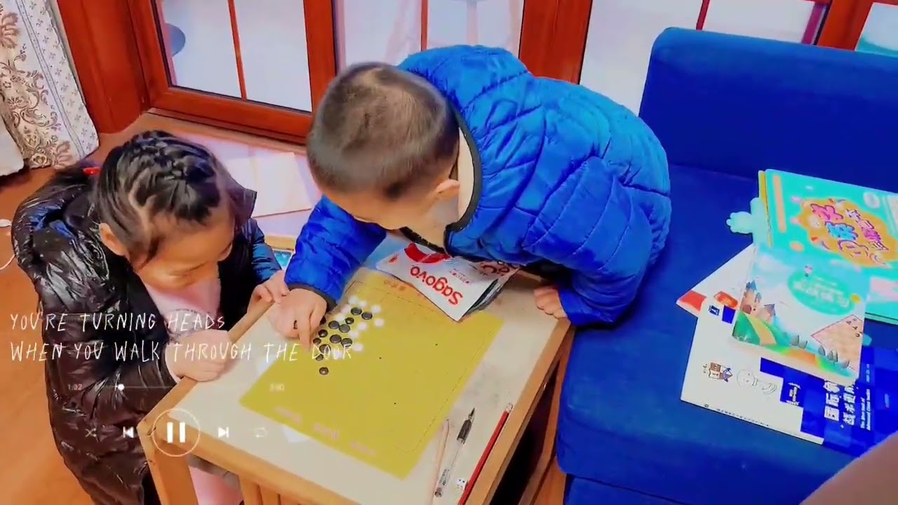 A boy who likes playing chess