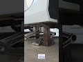 A handmade steel extension designed to increase the reach of a standard scissor jack
