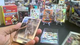 Opening a 2022 Topps Chrome Baseball Pack. Nice Sepia Wave Refractor insert pulled. Check it Out.