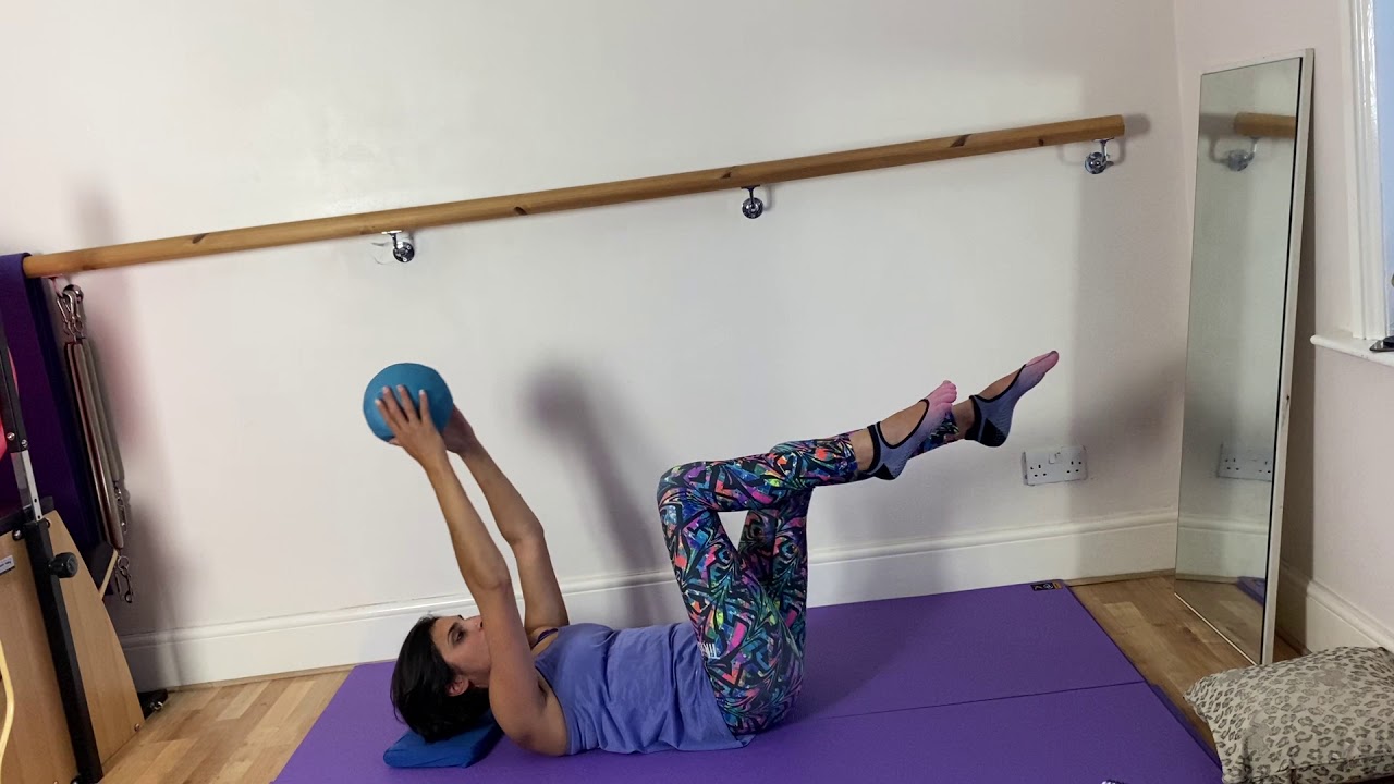 Pilates ball single leg stretch variation YouTube