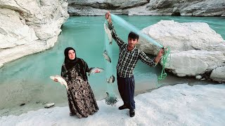 Fishing in the roaring river by a nomadic family: Babak and Narges...Iran 2023