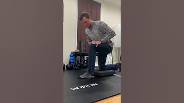 Half-kneel ankle dorsiflexion biasing calcaneal eversion and mid-foot pronation