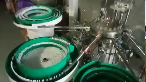 Automatic aerosol can actuator valve element assembly machine