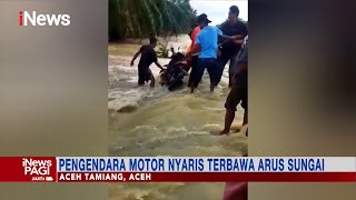 Nekat Terobos Banjir, Pengendara Motor Terseret Derasnya Arus Air #iNewsPagi 06/01