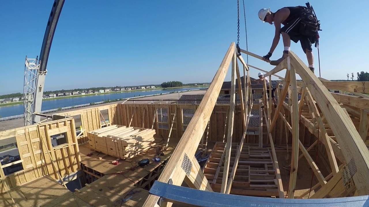 Crane set roof trusses YouTube