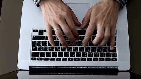 Man Typing On Laptop Stock Video