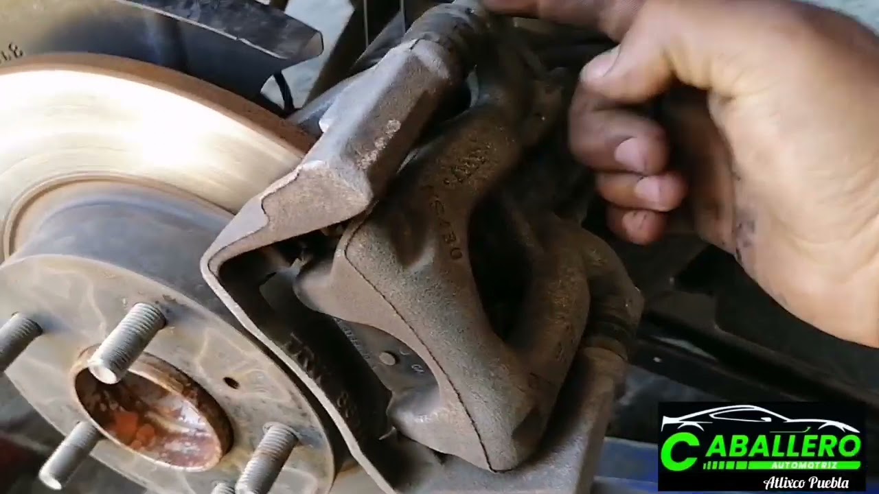 cambio de frenos traseros. mazda 3 2018.sistema EPB.