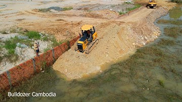 The Best Mini Dump Truck Unloading Dirt Into Slope And Small Bulldozer Pushing Building New Dam