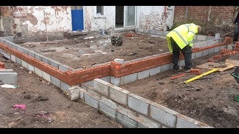 Bricklaying up to damp course, in Knutsford Cheshire