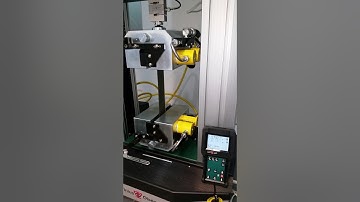 Tensile Test on 70mm Webbing using a Tinius Olsen 50ST Material Testing Machine with Hydraulic Grips