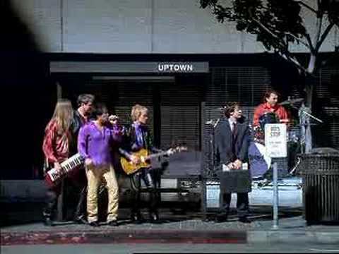 The band Survivor parodies their song "Eye of the Tiger" while following a man named Glen on his way to work.