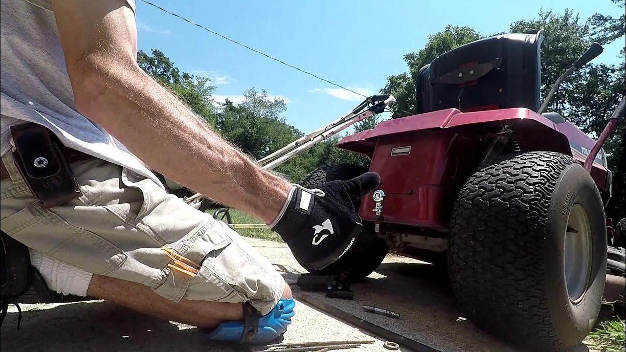 Installing a trailer ball on a riding lawnmower. YouTube