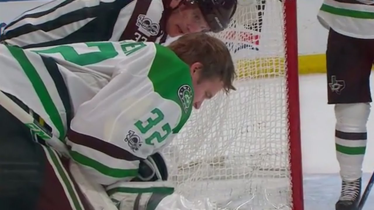 Lehtonen shaken up after a Slepyshev shot knocks off his mask