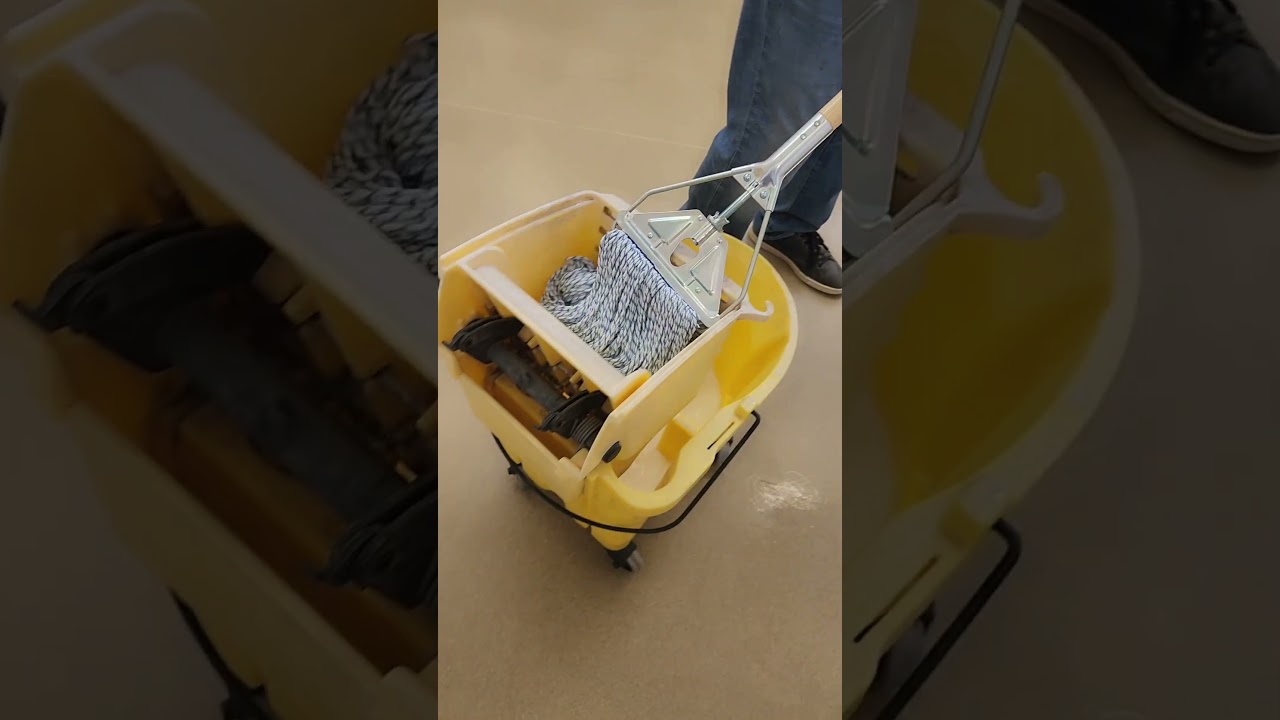 Scrubbing & Rewaxing School VCT Floors. 