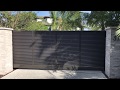 Aluminum privacy louvered driveway gate. Aluminum privacy louvered driveway gate.