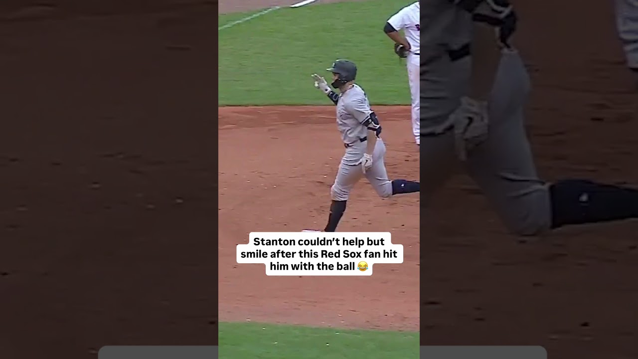 Giancarlo Stanton couldn’t help but smile after this Red Sox fan hit him with the ball 😂 #baseball